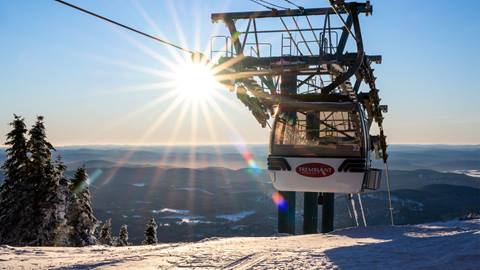 Panoramic view of the Tremblant gondola and sunset at the summit.