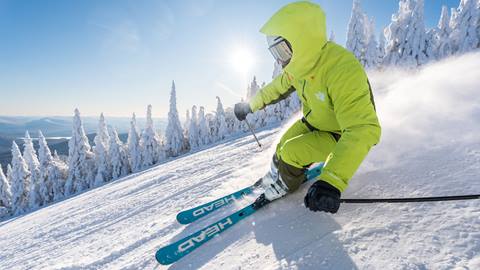 tonik ski pass holder gliding down a slope at tremblant resort