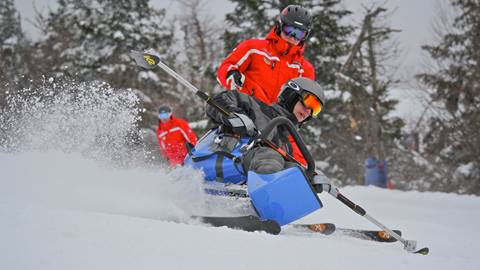 Adaptive skiing at Mont-Tremblant Resort featuring the Mountain for All package and sit-ski equipment for guests with reduced mobility.