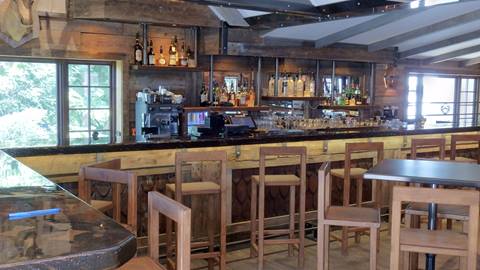 Interior bar and seating area at Le P'tit Caribou in the Tremblant pedestrian village.