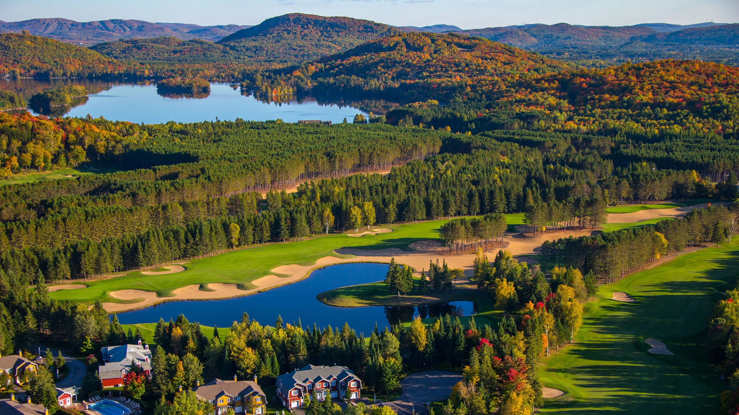 Golfers enjoying autumn at Mont Tremblant Golf Le Diable